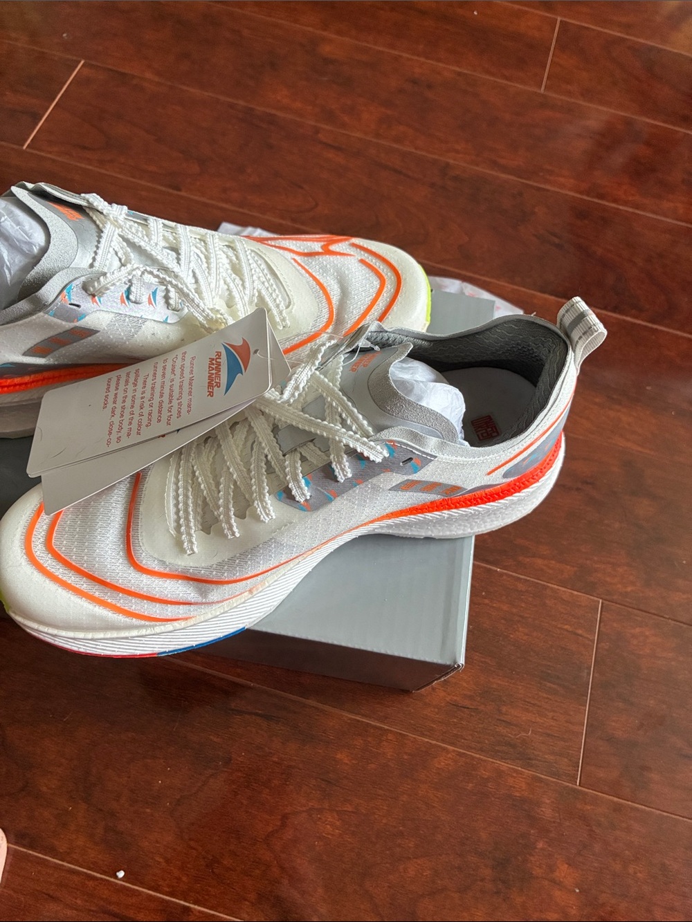 White Athletic Sneakers with Neon Orange Accents